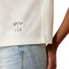 Ladies Ariat x PBR Cloud Dancer Cropped T-Shirt - Model Image Zoomed in Ariat x PBR Logo View